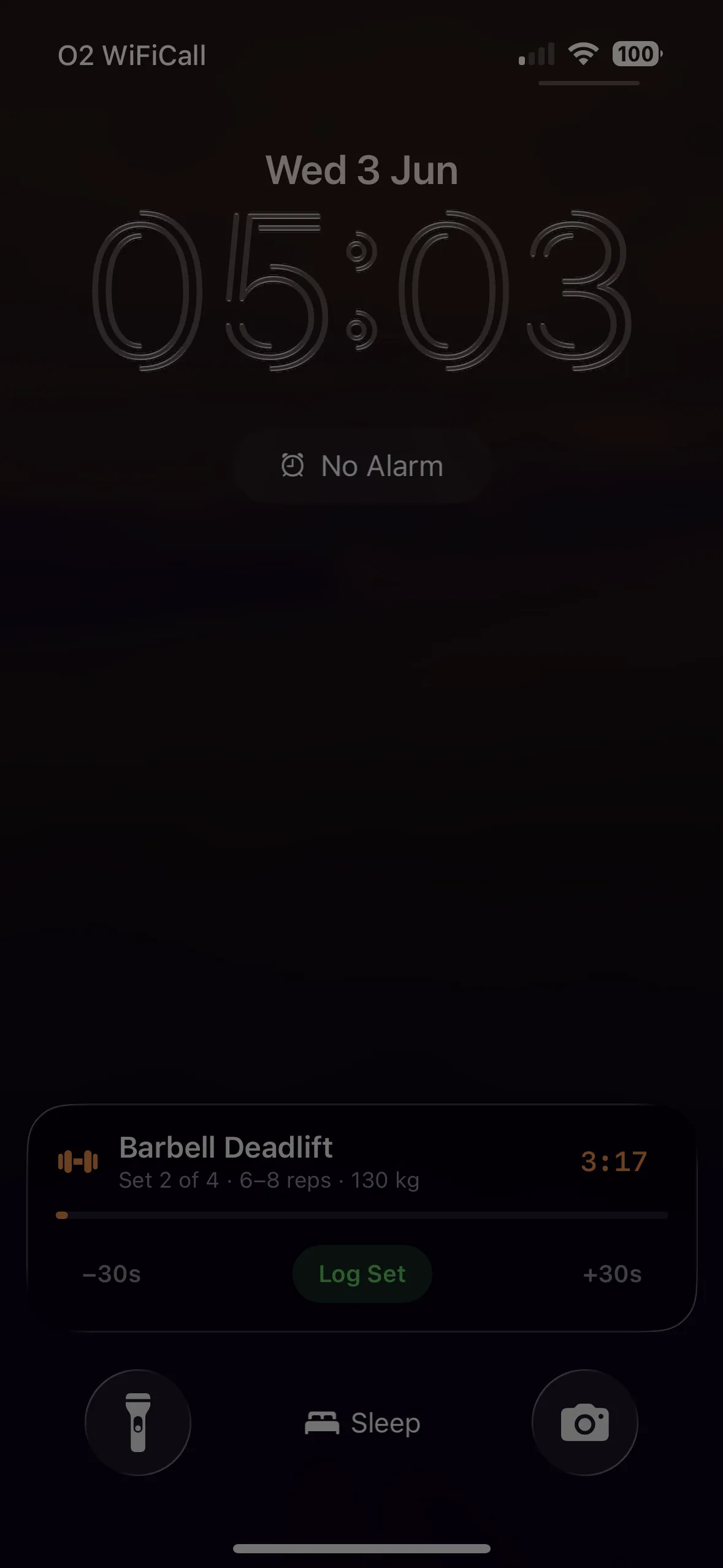 SteelRep Live Activity on the Lock Screen — rest timer countdown with Log Set and skip controls